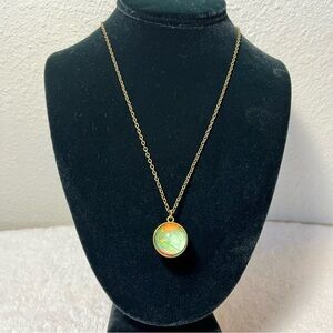 World map pendant necklace.